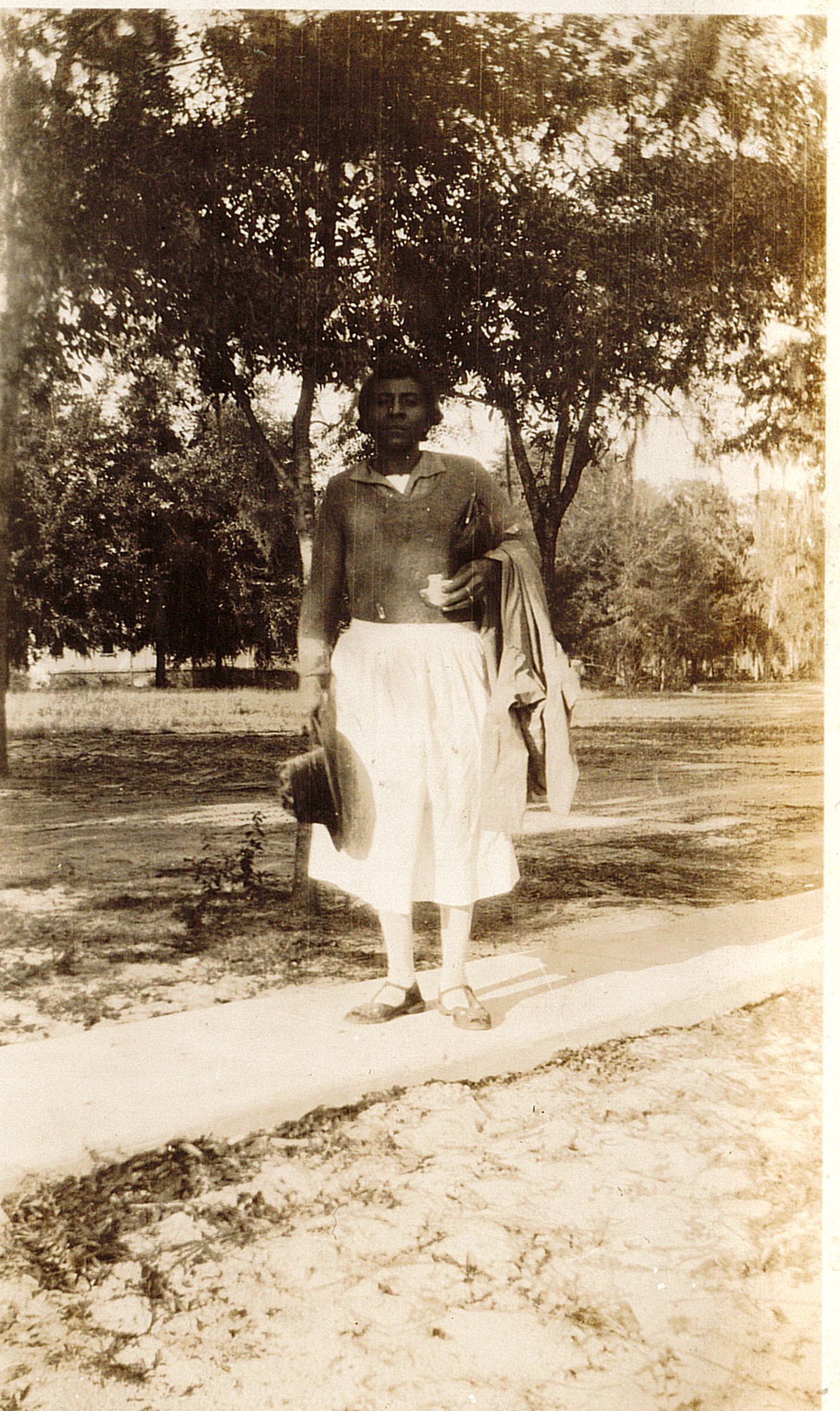 Susie [no last name provided], who lived in Hannibal Square, was a domestic worker at Rollins College when this photograph was taken in the 1930s.