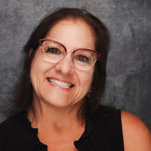 Headshot photo of Page Curry